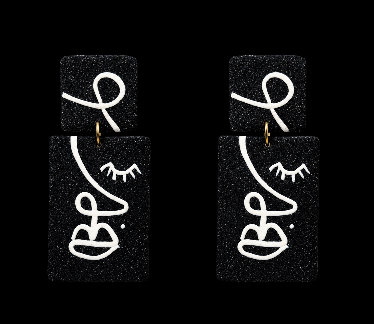 Handmade Black and White Face Sculpt Earrings
