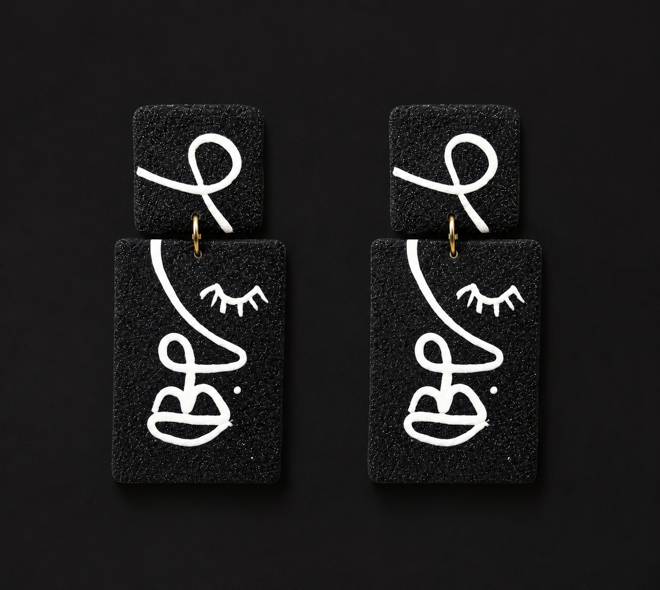 Handmade Black and White Face Sculpt Earrings